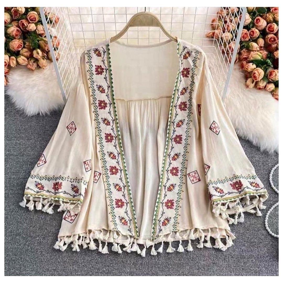 Jenna Tasseled Cape In Beige