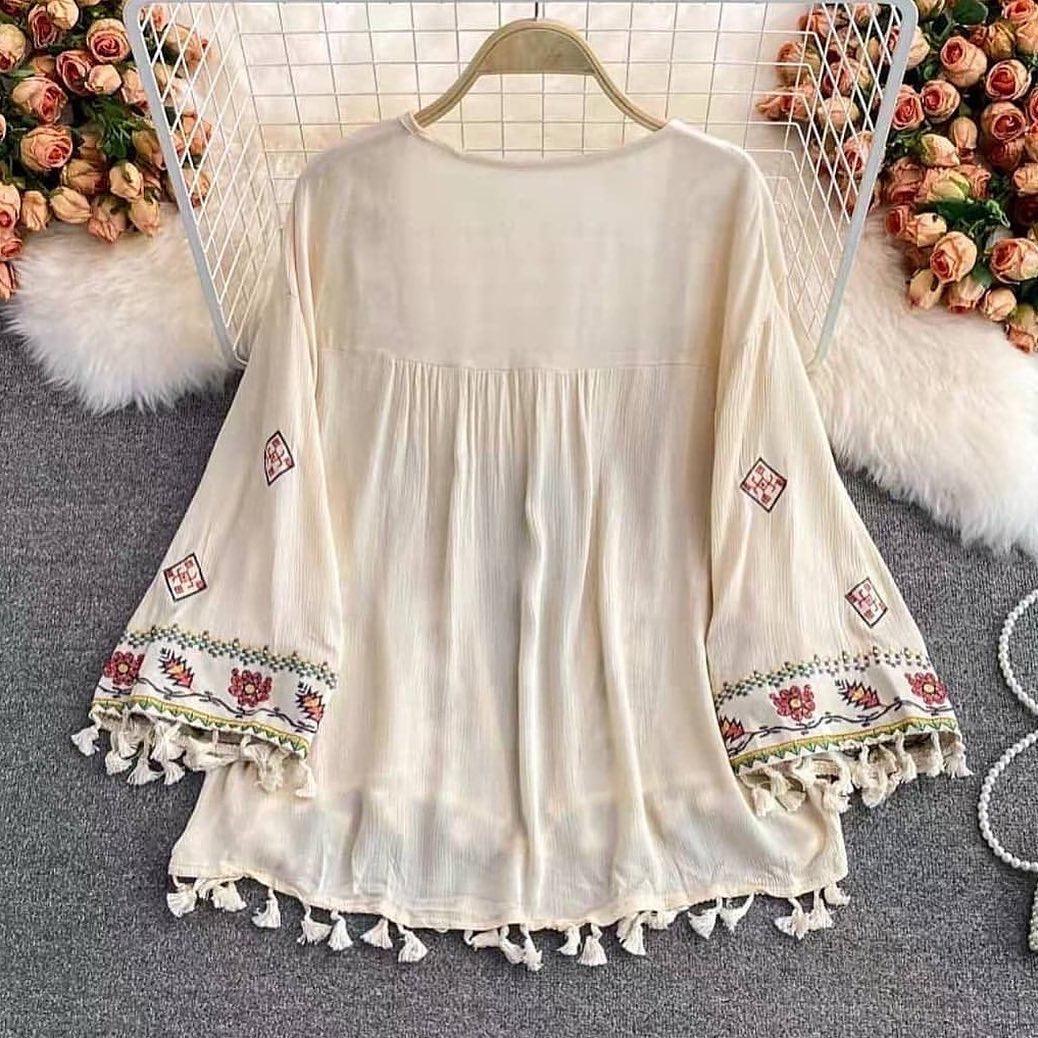 Jenna Tasseled Cape In Beige