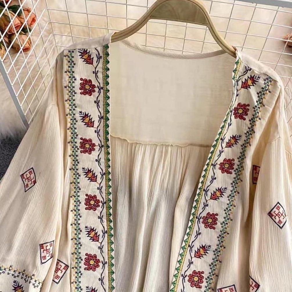 Jenna Tasseled Cape In Beige